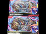 two boxes of pokemon cards are shown on a black background