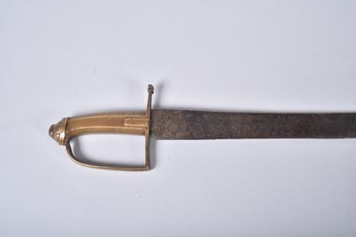 an image of a sword that is on a white surface