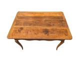 an old wooden table with a wooden top on a white background