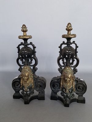 pair of antique cast iron candlesticks with lion heads