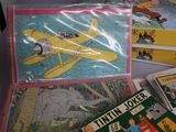 a lot of children ' s books that are on the table