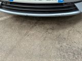 a picture of a car that is parked in a parking lot