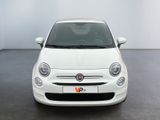 the front view of a white fiat car in a white room