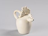 a white vase with a horse head on it