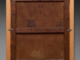 an old wooden picture frame with a metal latch on it