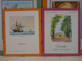 three framed pictures of a boat and a boat on the water