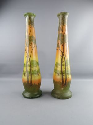 pair of hand painted glass vases with trees on them
