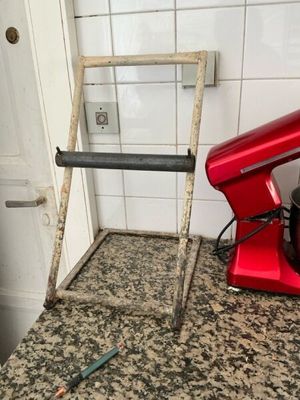 a red mixer on the counter next to a red mixer