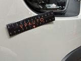 a sticker that says vauto on the side of a car
