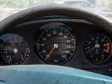 a close up of the dashboard of a car with the gauges on