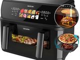 an image of a black air fryer with a pizza inside of it