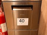 an image of a stainless steel dishwasher and fire extinguisher