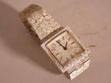 a watch that is sitting on top of a table