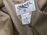 the label on a chanel coat is clearly visible