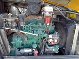 a truck with a large engine in the back of it