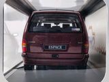 a picture of a car in a box with a sticker on it