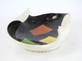 a black and white bowl with a colorful design on it
