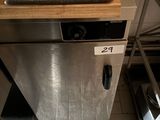 a stainless steel dishwasher in a kitchen with a wooden counter top