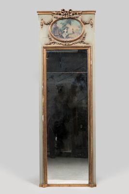 an antique mirror with a painting on the back of it