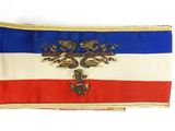 an image of a red, white, and blue flag with a gold eagle on it
