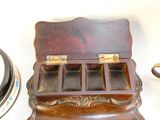 a small wooden box with four compartments and a pair of scissors