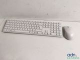 a computer keyboard and mouse sitting on a desk