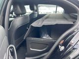 a car that has a seat in the back of it