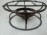 an image of a metal fire pit on a white background