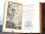 an open book with a picture of a man riding a horse