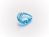 a blue topazte gems on a white background