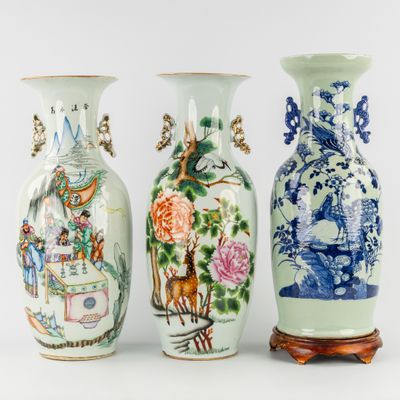 three vases sitting side by side on a white surface
