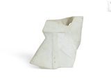 a white vase that has a white design on it