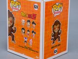 a box with a cartoon figure inside of it on top of a table