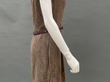 an image of a mannequin wearing a brown dress with a purple belt