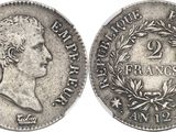 une pièce d'argent portant l'image d'un homme