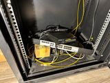 a rack with a bunch of wires in it