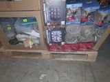 a lot of items that are on a pallet in the warehouse