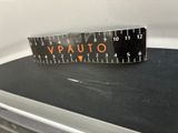 a ruler that is sitting on top of a stove