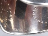 a close up of a metal pan with a handle