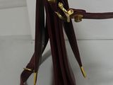 a purse that is on a stand on a table