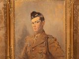 portrait of a man in a military uniform in a gold frame