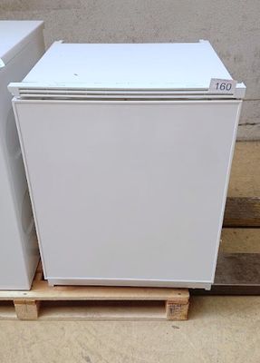 two white refrigerators sitting on a pallet next to each other