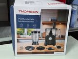 a box that has a blender in it on a table