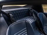 an image of a blue car with black leather seats