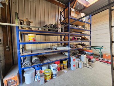 a garage filled with lots of tools and supplies