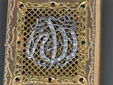 a picture of a gold and silver box with a dragon on it