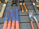 many different tools that are sitting on a table