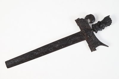 an old iron sword with a decorative design on it