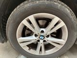 a close up of a tire on a car ' s rim