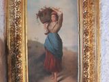un tableau représentant une femme portant un panier sur la tête